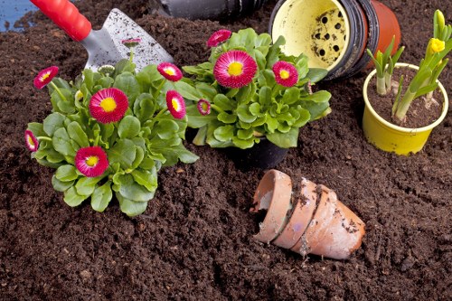 Stylish landscape gardening in South Ruislip with patio and planting