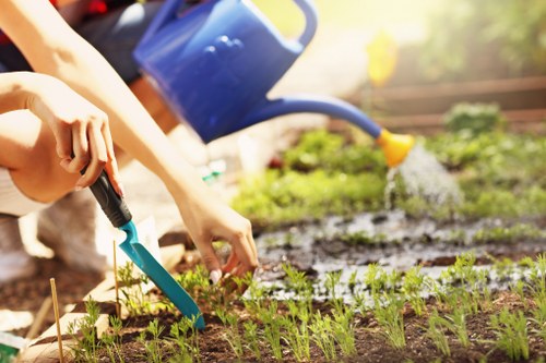 Gardening team applying health and safety practices